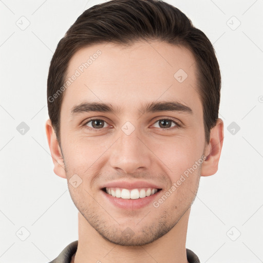 Joyful white young-adult male with short  brown hair and brown eyes