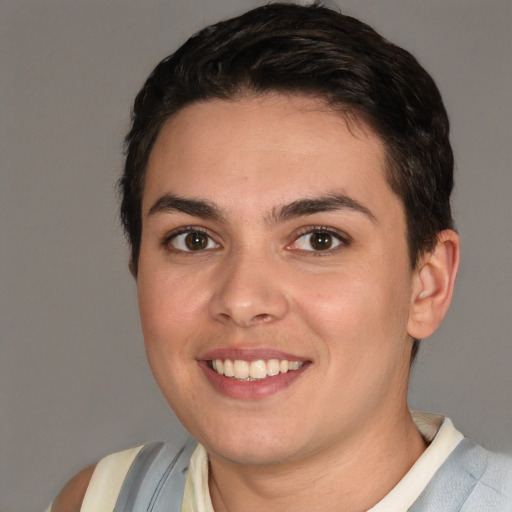 Joyful white young-adult female with short  brown hair and brown eyes