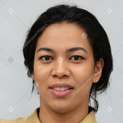 Joyful latino young-adult female with medium  brown hair and brown eyes