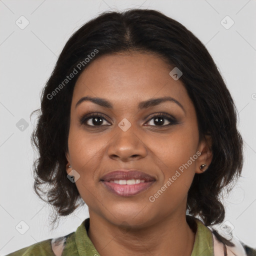 Joyful black young-adult female with medium  brown hair and brown eyes