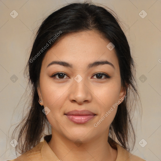 Joyful latino young-adult female with medium  brown hair and brown eyes