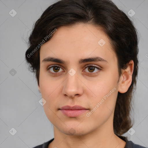 Neutral white young-adult female with medium  brown hair and brown eyes