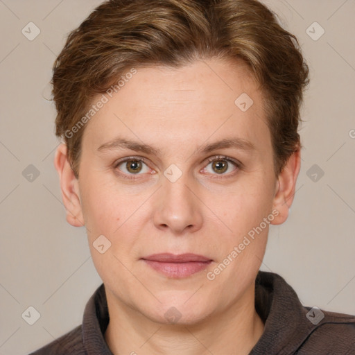 Joyful white adult female with short  brown hair and grey eyes