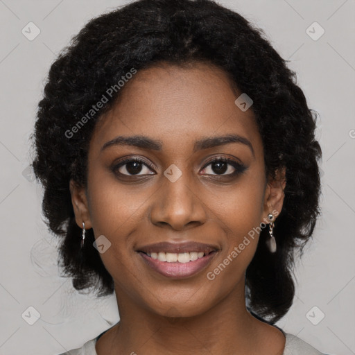 Joyful black young-adult female with medium  black hair and brown eyes