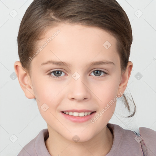 Joyful white child female with short  brown hair and brown eyes