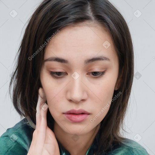 Neutral white young-adult female with medium  brown hair and brown eyes