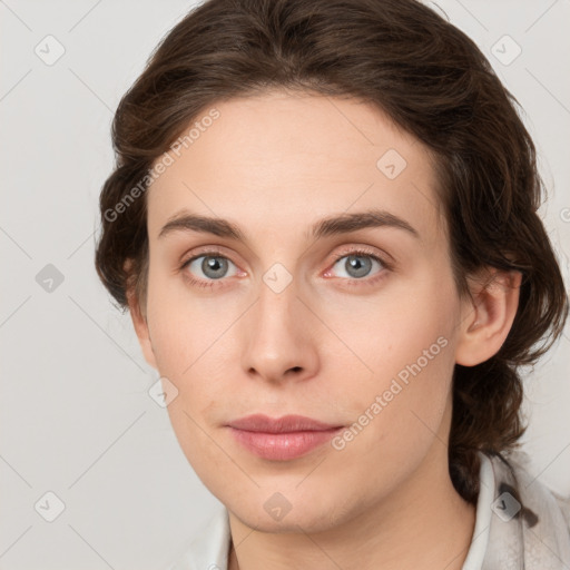 Neutral white young-adult female with medium  brown hair and grey eyes