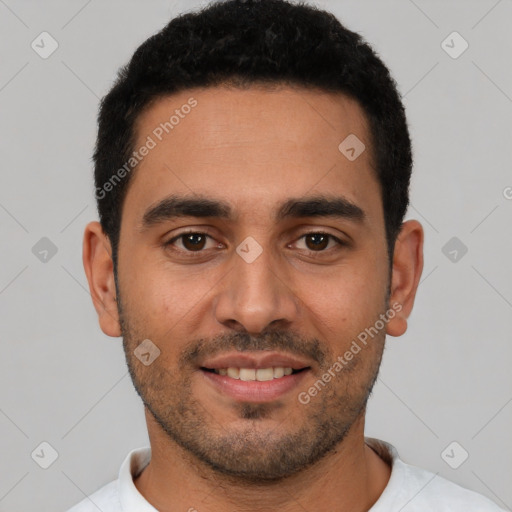 Joyful latino young-adult male with short  black hair and brown eyes