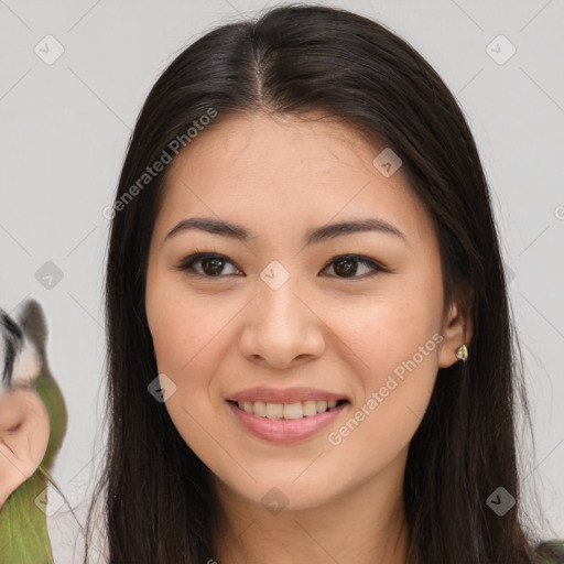 Joyful asian young-adult female with long  brown hair and brown eyes