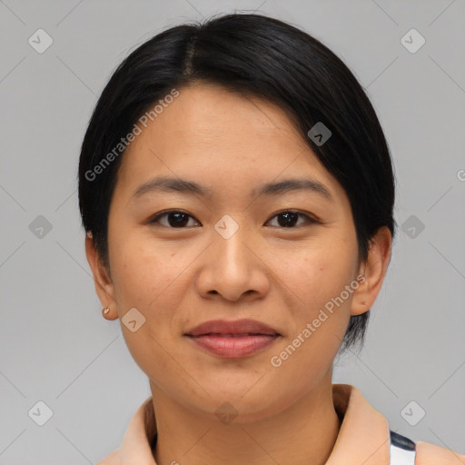 Joyful asian young-adult female with medium  black hair and brown eyes