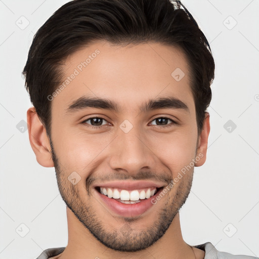 Joyful white young-adult male with short  brown hair and brown eyes