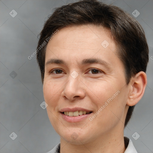 Joyful white adult female with short  brown hair and brown eyes