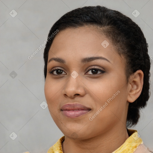 Joyful latino young-adult female with short  brown hair and brown eyes