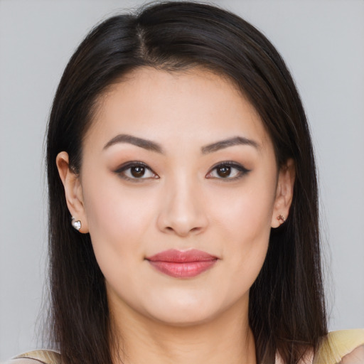 Joyful white young-adult female with long  brown hair and brown eyes