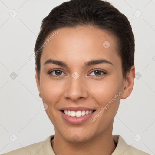 Joyful white young-adult female with short  brown hair and brown eyes