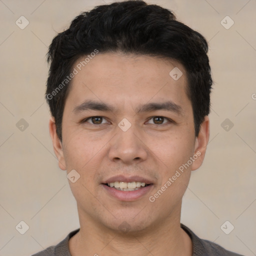 Joyful white young-adult male with short  black hair and brown eyes