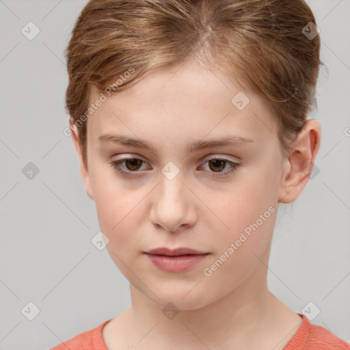 Joyful white child female with short  brown hair and brown eyes