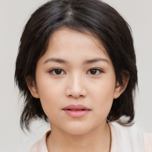 Neutral asian young-adult female with medium  brown hair and brown eyes