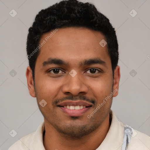 Joyful latino young-adult male with short  black hair and brown eyes