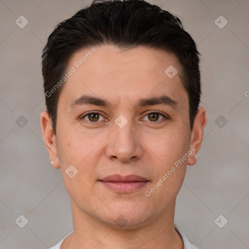 Joyful white adult male with short  brown hair and brown eyes