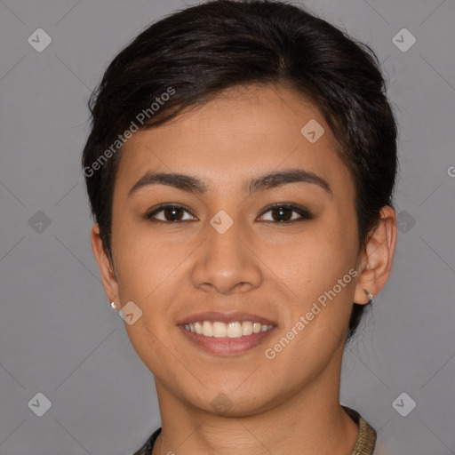 Joyful latino young-adult female with short  brown hair and brown eyes