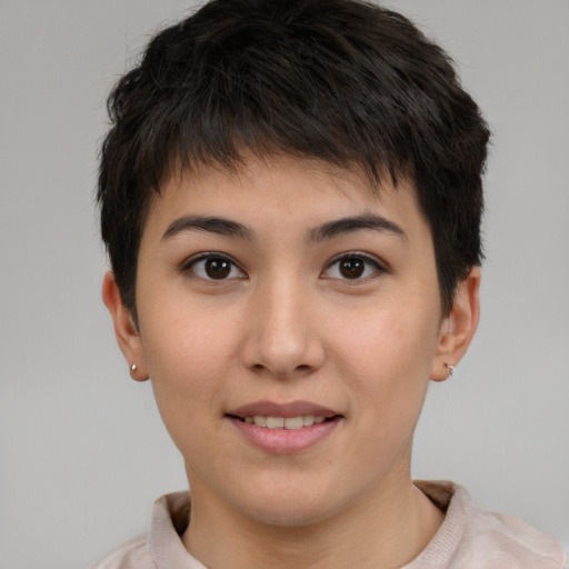 Joyful white young-adult female with short  brown hair and brown eyes