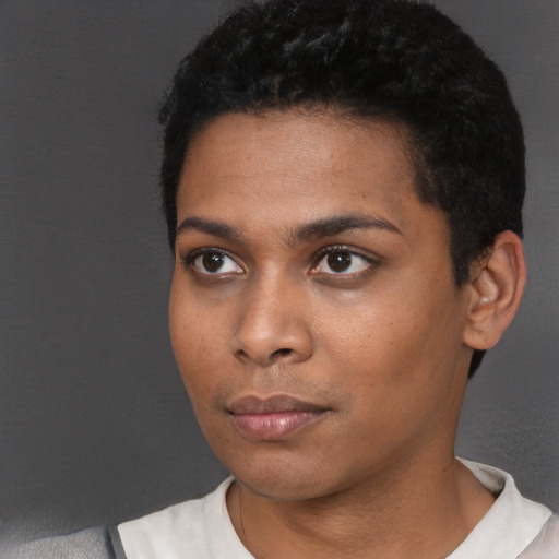 Neutral black young-adult female with short  black hair and brown eyes