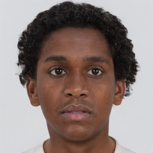 Neutral black young-adult male with short  brown hair and brown eyes
