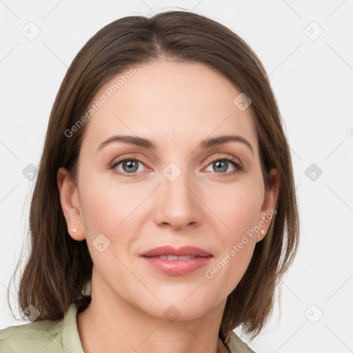 Joyful white young-adult female with medium  brown hair and grey eyes