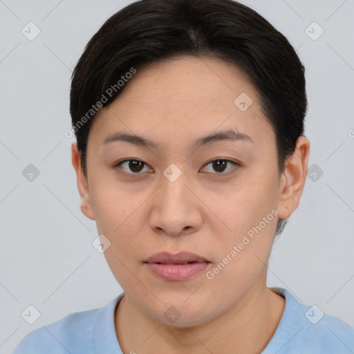 Joyful asian young-adult female with short  brown hair and brown eyes