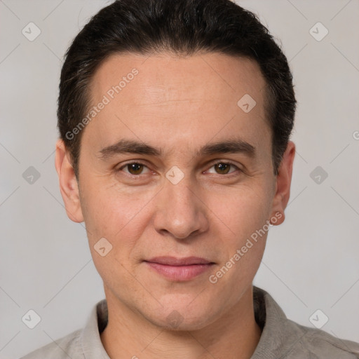 Joyful white adult male with short  brown hair and brown eyes