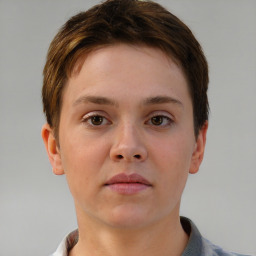 Neutral white young-adult female with short  brown hair and brown eyes