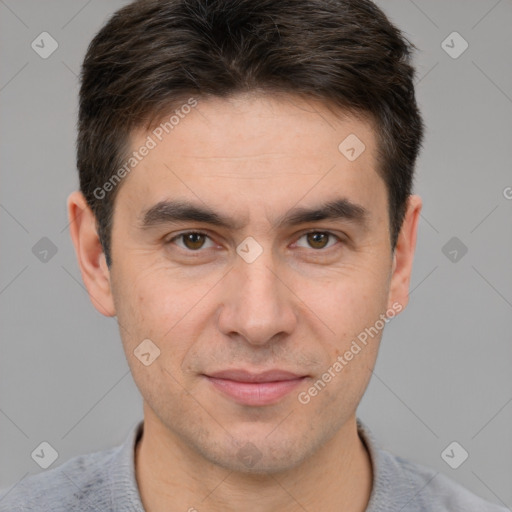 Joyful white young-adult male with short  brown hair and brown eyes