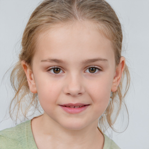 Joyful white child female with medium  brown hair and grey eyes