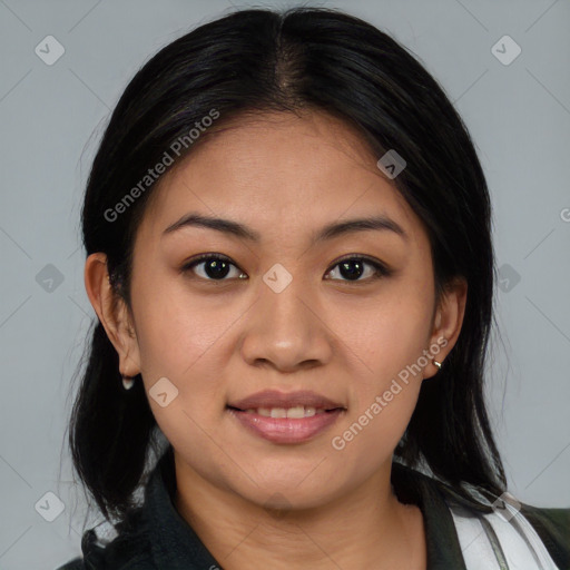 Joyful latino young-adult female with medium  brown hair and brown eyes