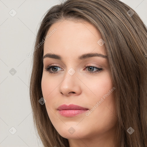 Neutral white young-adult female with long  brown hair and brown eyes