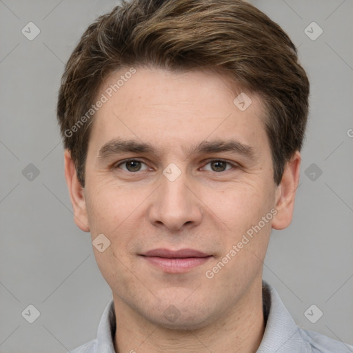 Joyful white adult male with short  brown hair and grey eyes