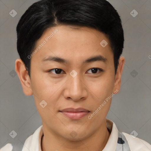 Joyful asian young-adult male with short  brown hair and brown eyes