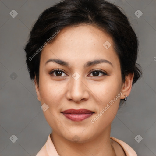 Joyful asian young-adult female with short  brown hair and brown eyes