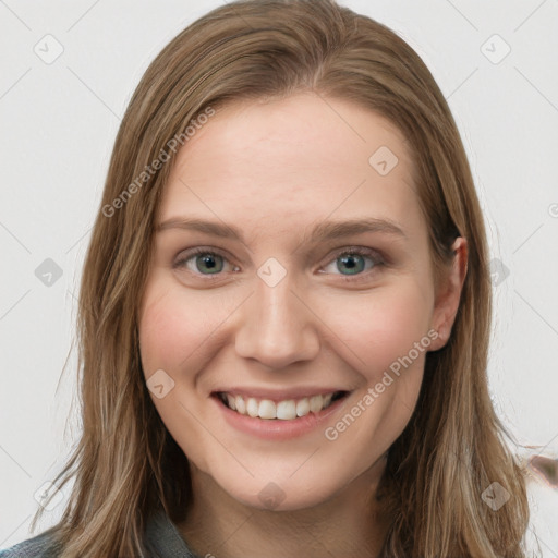 Joyful white young-adult female with long  brown hair and grey eyes