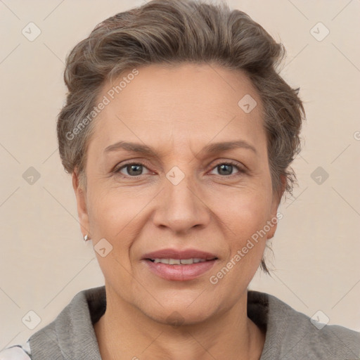 Joyful white adult female with short  brown hair and brown eyes