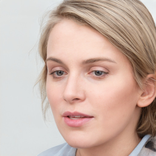 Neutral white young-adult female with medium  brown hair and blue eyes