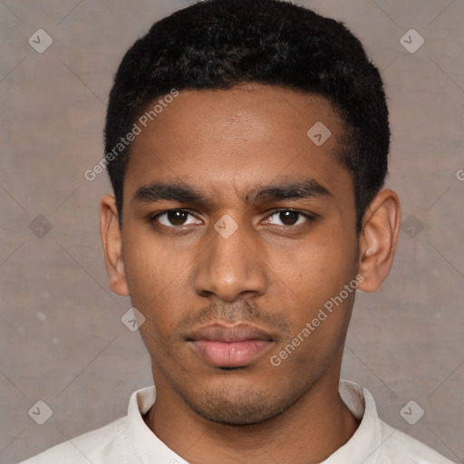 Neutral latino young-adult male with short  black hair and brown eyes