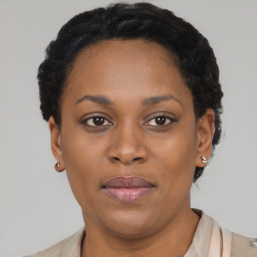 Neutral latino young-adult female with short  brown hair and brown eyes