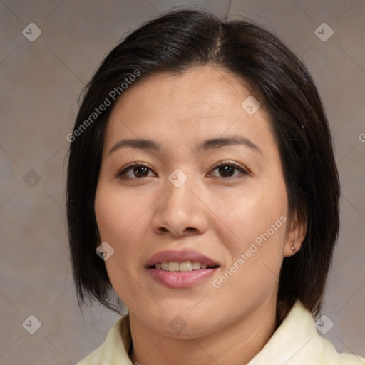 Joyful asian young-adult female with medium  brown hair and brown eyes