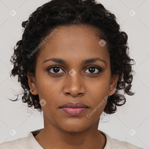 Neutral black young-adult female with short  brown hair and brown eyes