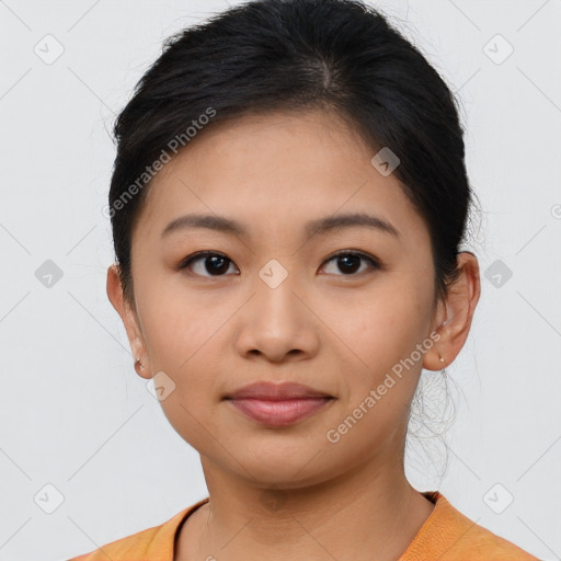 Joyful asian young-adult female with short  brown hair and brown eyes