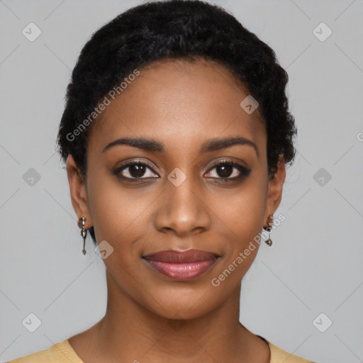 Joyful black young-adult female with short  black hair and brown eyes