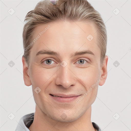 Joyful white adult male with short  brown hair and grey eyes