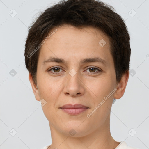 Joyful white young-adult female with short  brown hair and brown eyes